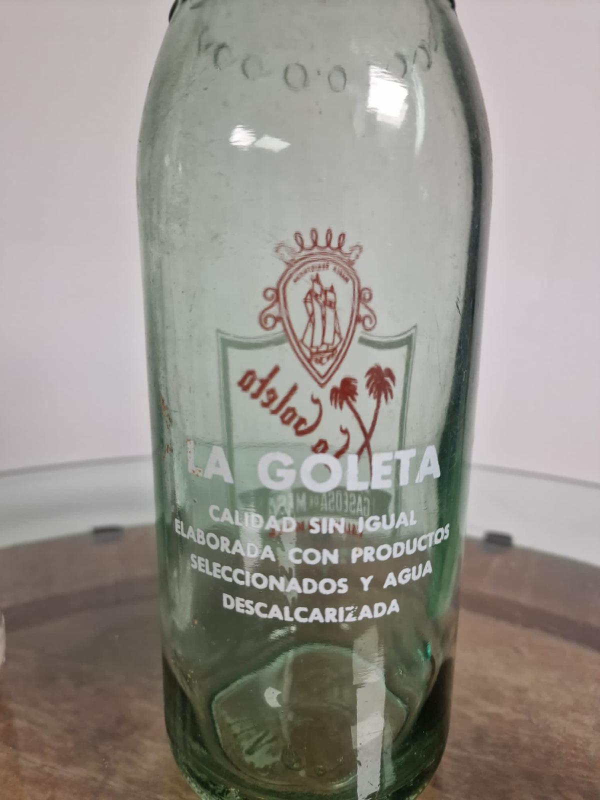 Parte trasera la botella de la gaseosa La Goleta - Jávea.com | Xàbia.com